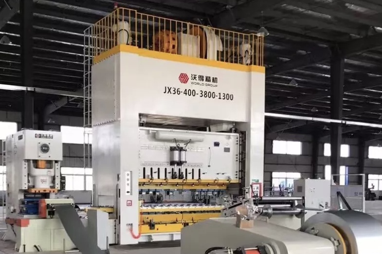 Crank press with feeder.